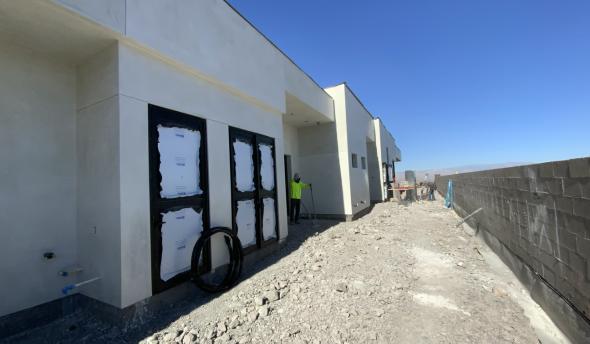 Exterior Image of windows and stucco at TNAH 2024